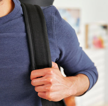 close up image of the backpack straps on the Roam Padded Roller Backpack